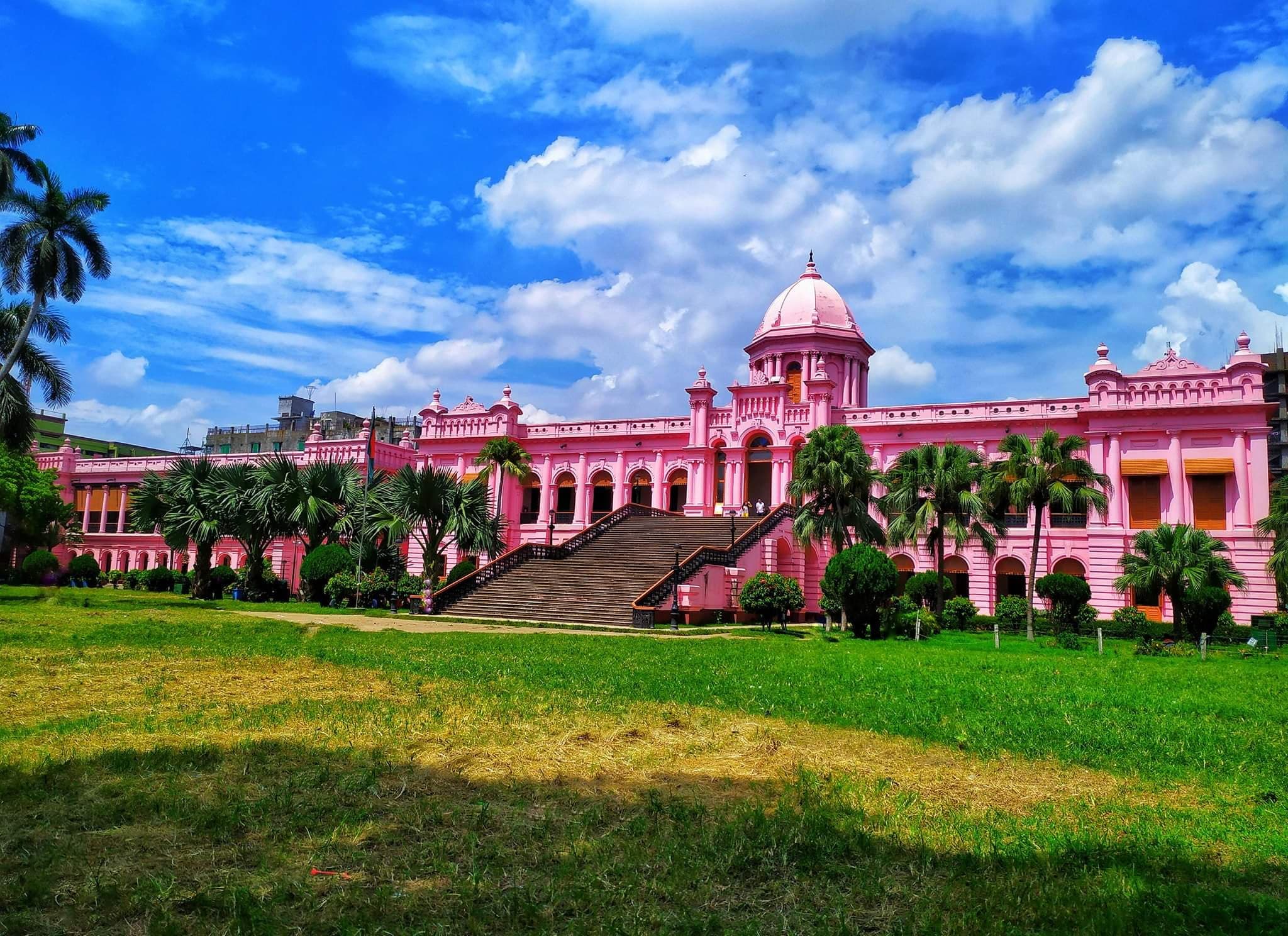 Ahsan Manzil, the pink palace in Dhaka, beneath a blue sky